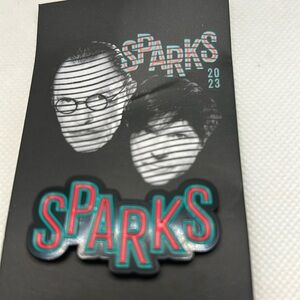Pin, Sparks- an American pop duo. Never worn